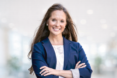 A photo of a person in a blue blazer.