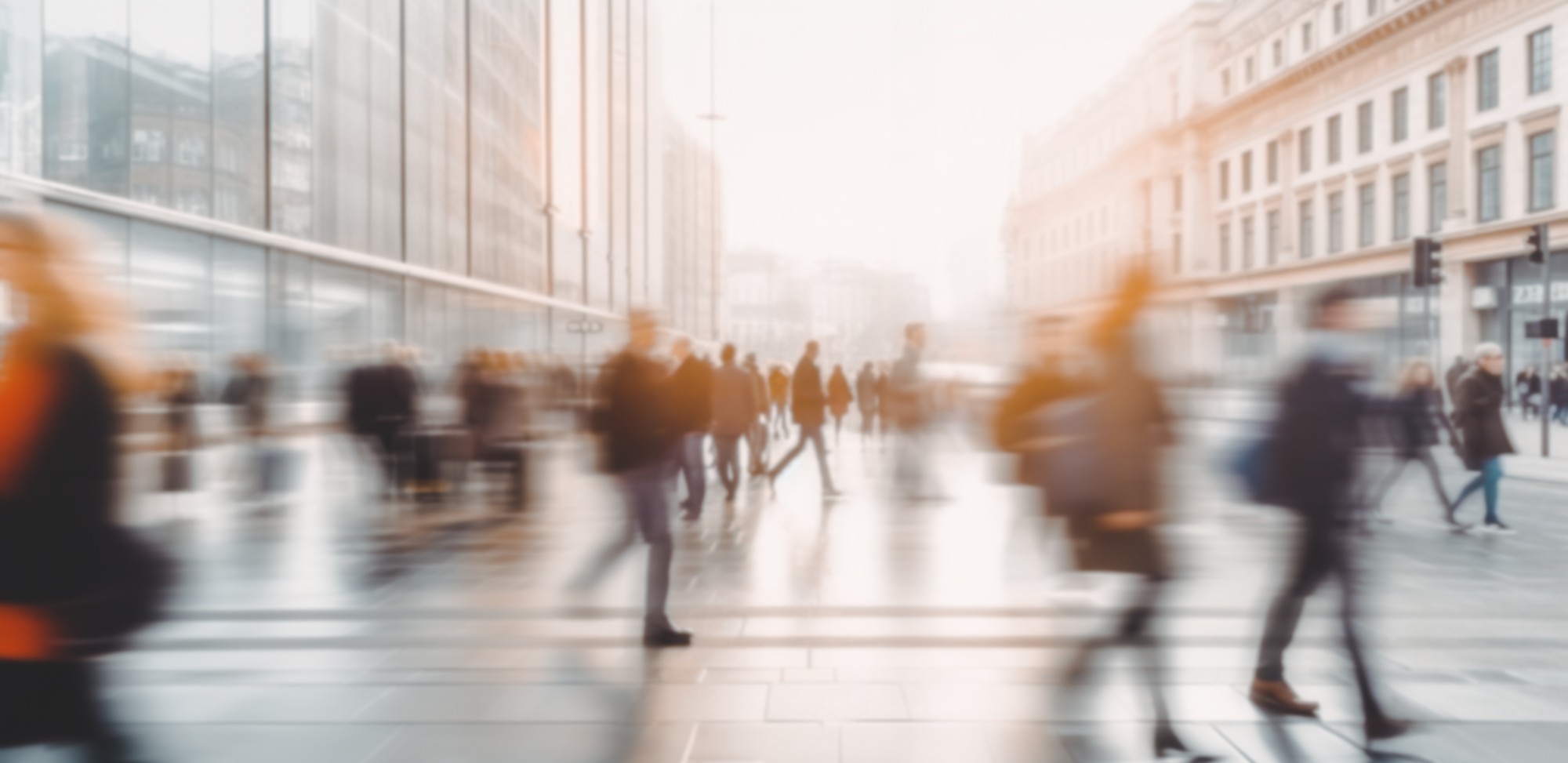 A blurred photo of people walking.