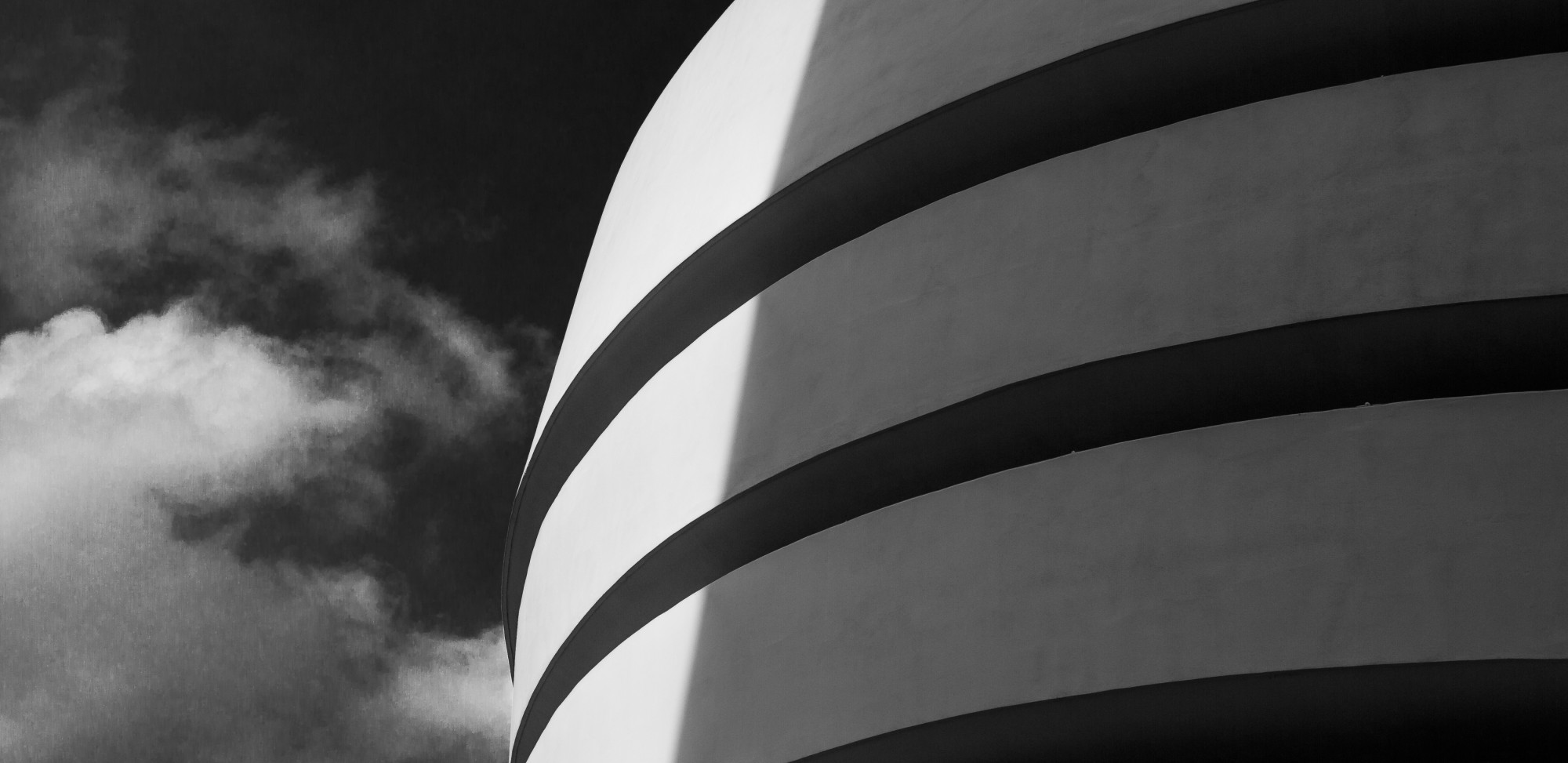 A black and white photo of the Guggenheim Museum in New York City