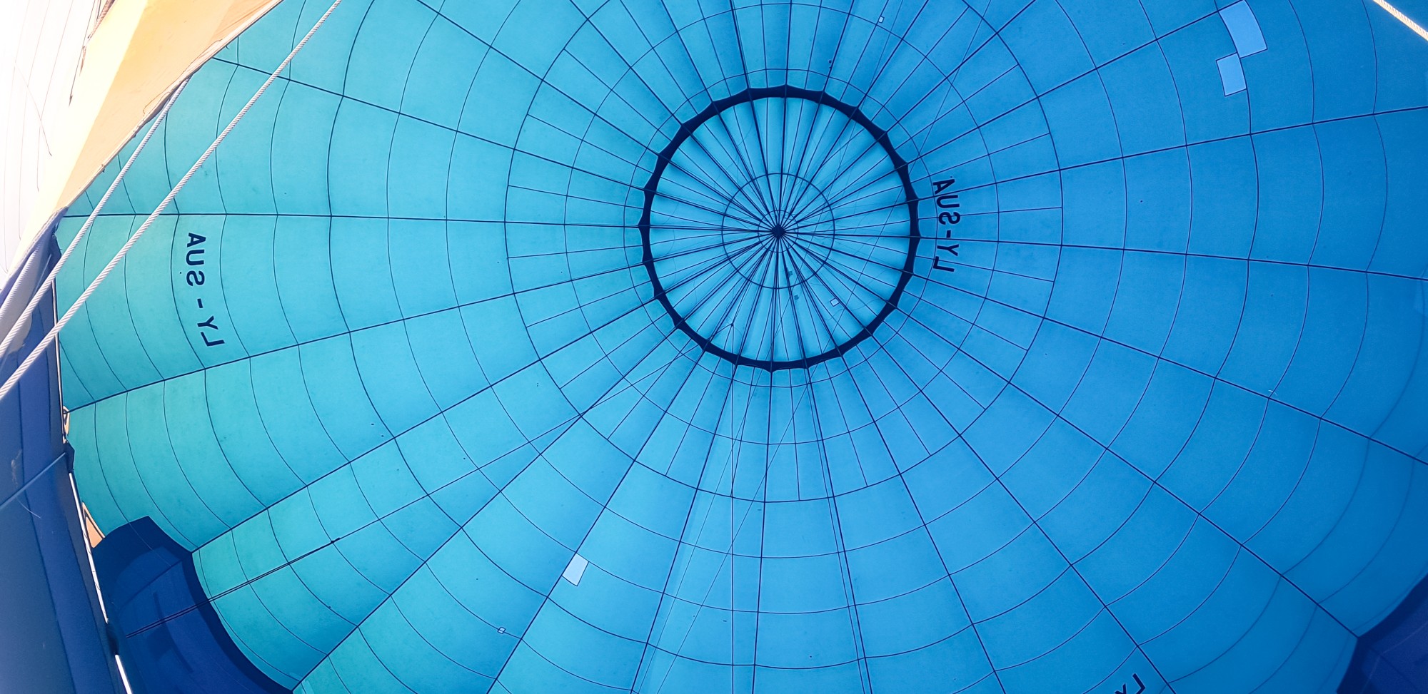 A close up photo of the inside of a hot air balloon.