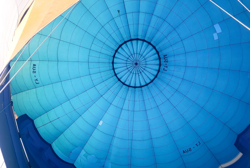 A close up photo of the inside of a hot air balloon.