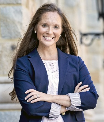 A photo of a person wearing a blue blazer.