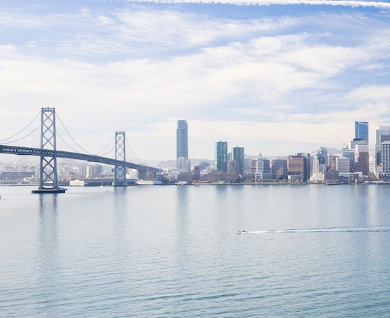 San Francisco Bay Bridge with city in the background.