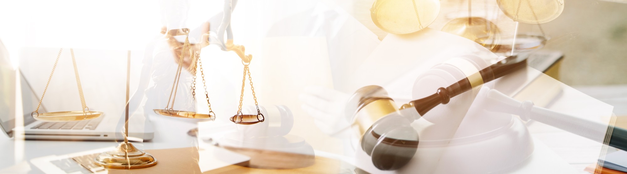 A photo of justice scales and a judge's gavel.