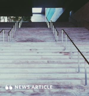 Concrete stairs with a railing. 