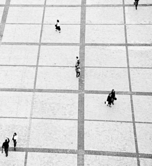 An arial photo of people walking in pairs.